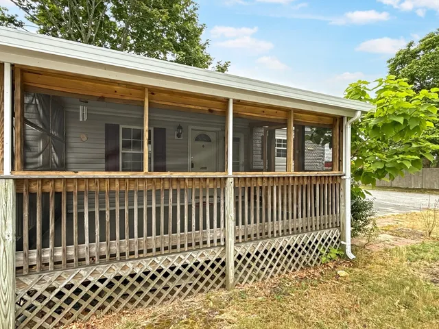 a back view of a house with a window