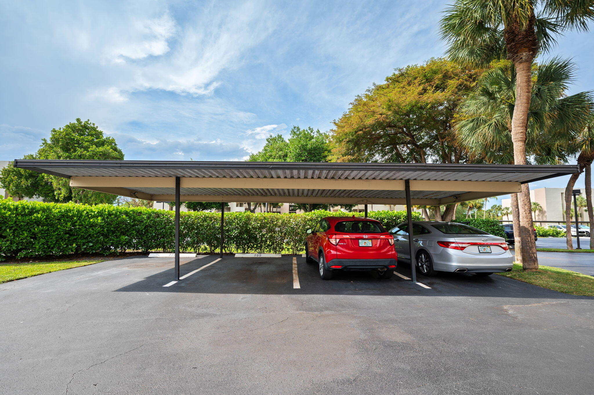5701 Camino Del Sol, Unit 104 Boca Raton, FL 33433 - Photo 29 of 34 carport