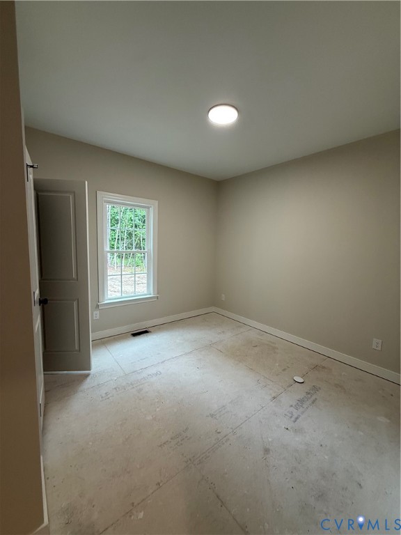 20545 Braxton Road Barhamsville, VA 23011 - Photo 17 of 22 an empty room with a window