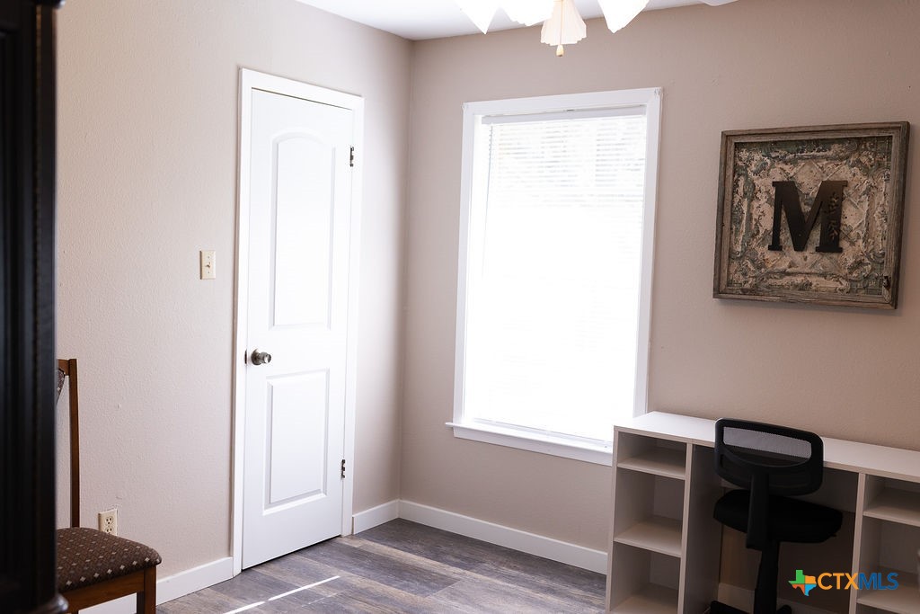 188 Cavalry Road Victoria, TX 77905 - Photo 20 of 26 a view of a hallway with workspace and a window