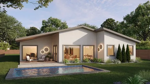 a view of a house with backyard and garden