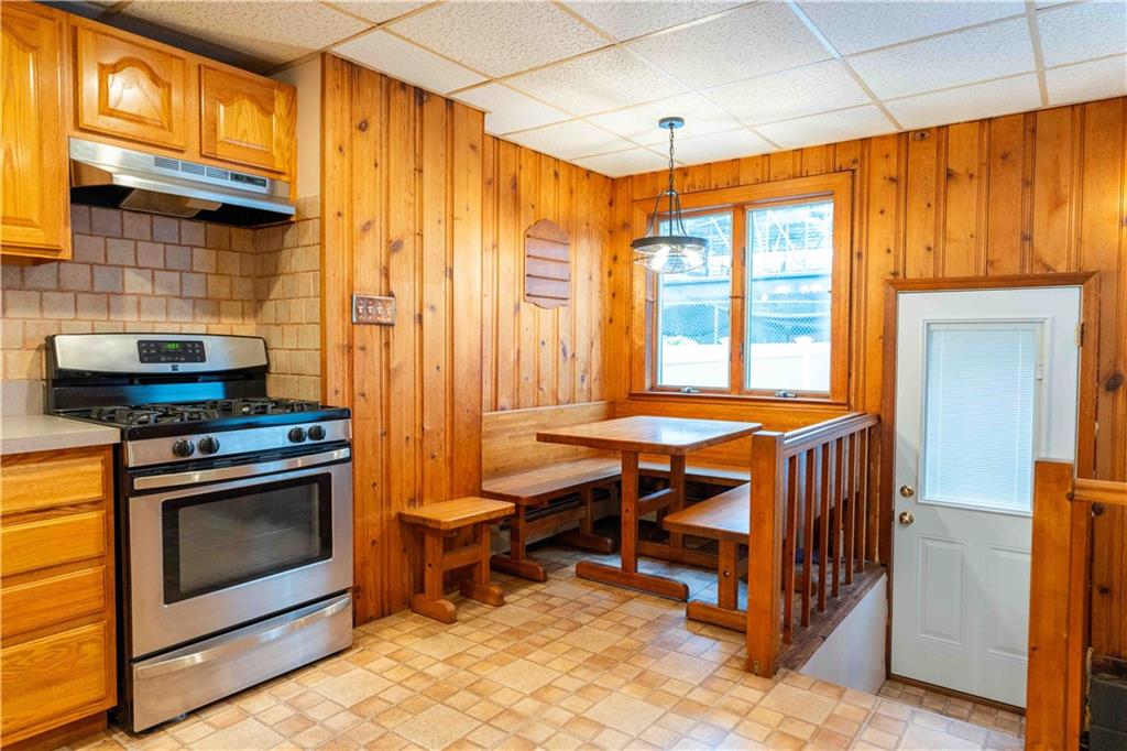2222 Stuart Street Brooklyn, NY 11229 - Photo 15 of 31 a kitchen that has a sink and a stove