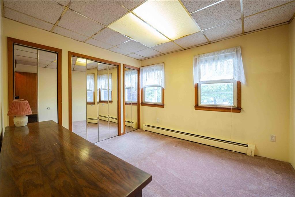 2222 Stuart Street Brooklyn, NY 11229 - Photo 16 of 31 a view of an empty room with glass door
