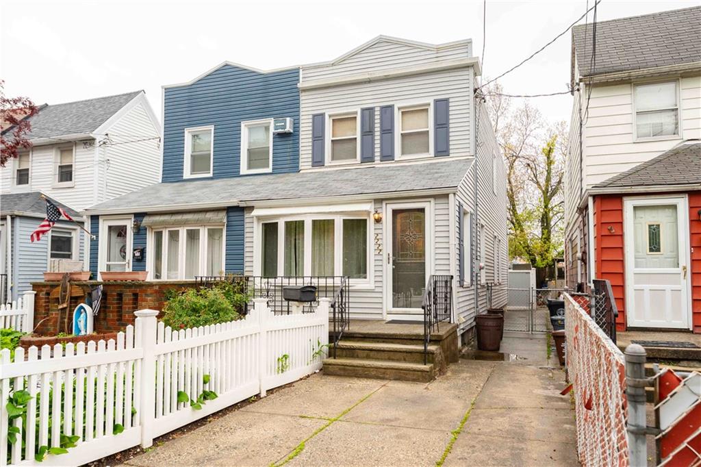 2222 Stuart Street Brooklyn, NY 11229 - Photo 2 of 31 a front view of a house with a porch