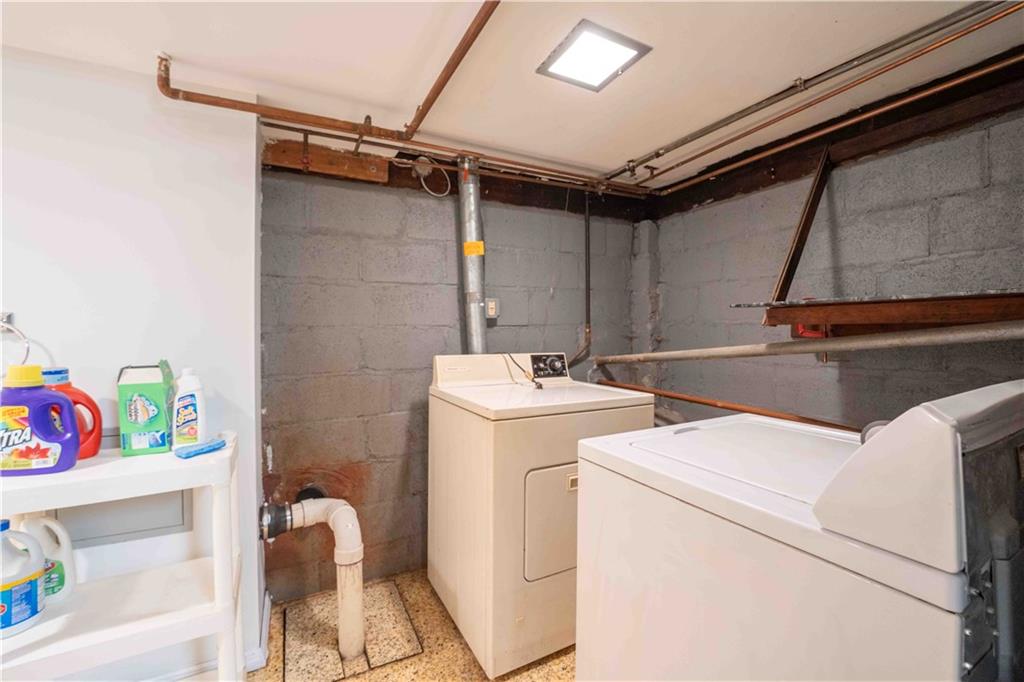 2222 Stuart Street Brooklyn, NY 11229 - Photo 25 of 31 a utility room with dryer and washer