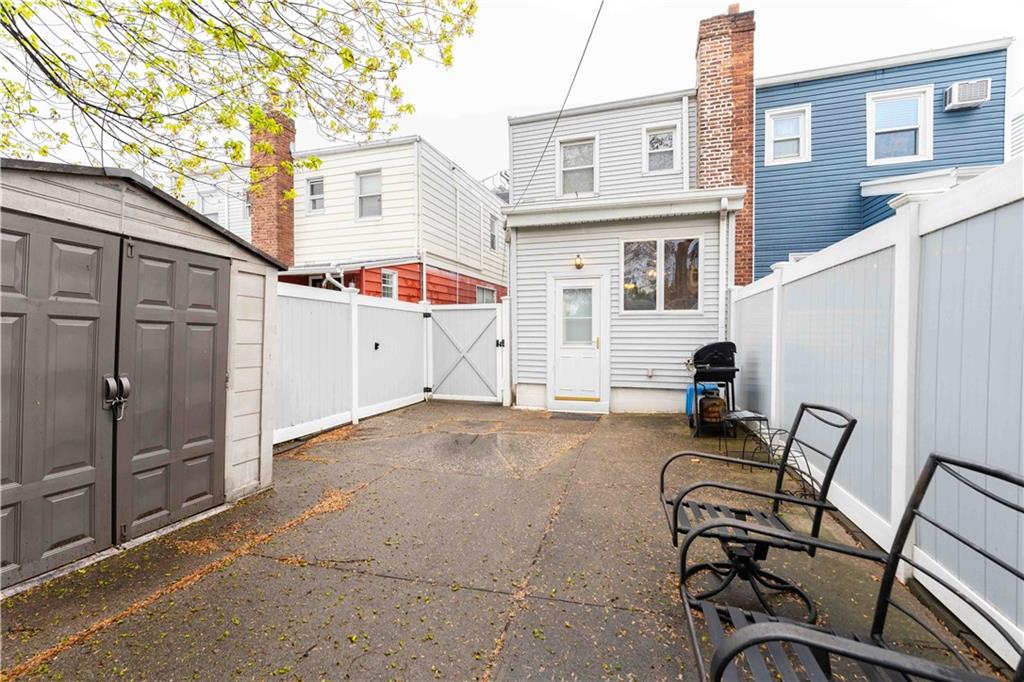 2222 Stuart Street Brooklyn, NY 11229 - Photo 29 of 31 a view of a patio with a table and chairs and barbeque