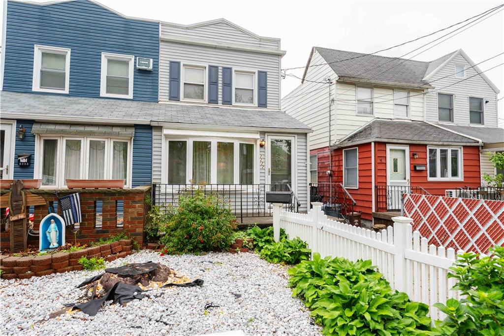 2222 Stuart Street Brooklyn, NY 11229 - Photo 4 of 31 a front view of a house with garden