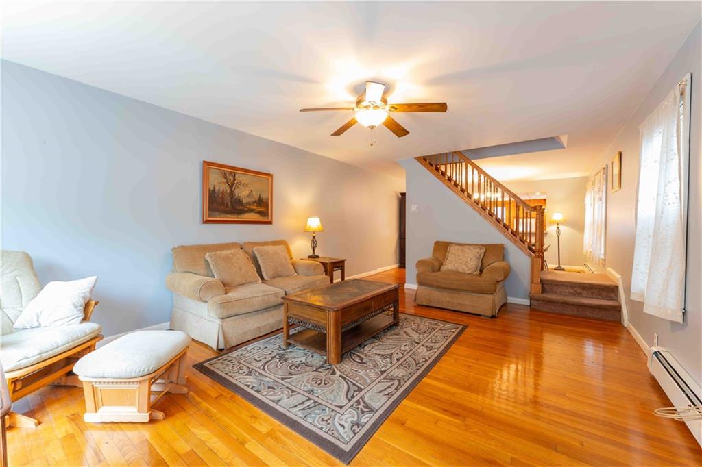 2222 Stuart Street Brooklyn, NY 11229 - Photo 5 of 31 a living room with furniture and a rug