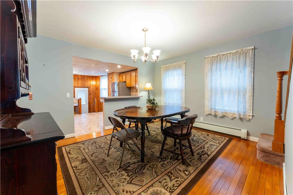 2222 Stuart Street Brooklyn, NY 11229 - Photo 8 of 31 a view of a dining room with furniture and wooden floor