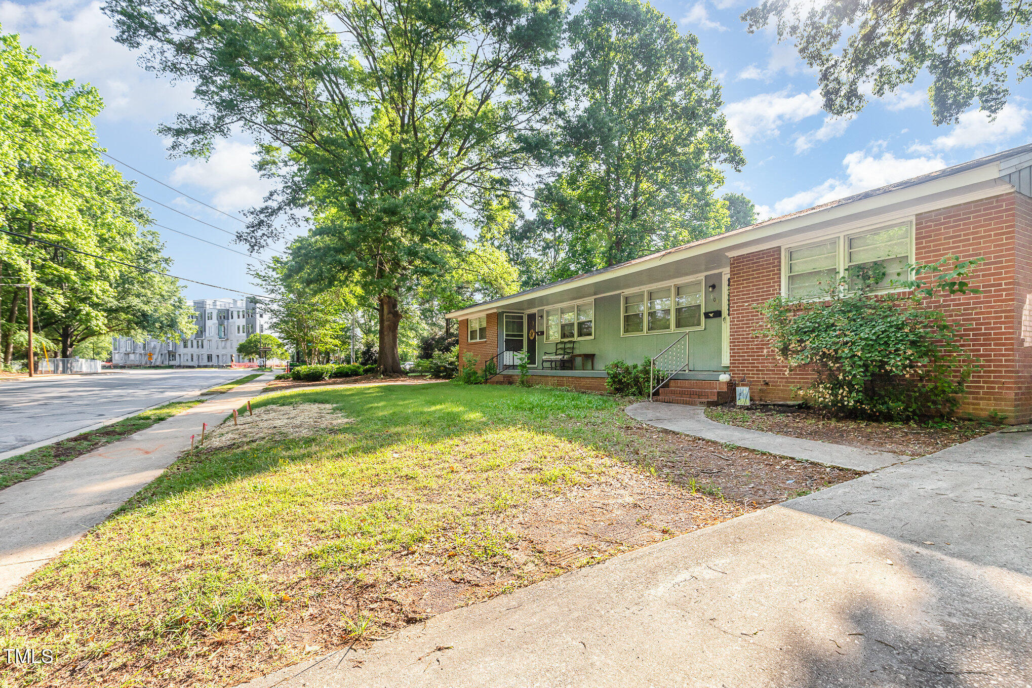 603 Kildaire Farm Road, Unit 603605 Cary, NC 27511 - Photo 7 of 14 a view of house with yard