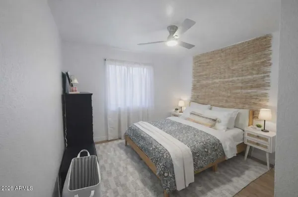 a bedroom with a bed and a walk in closet