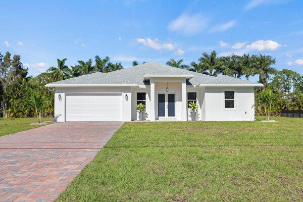 18103 Hamlin Boulevard Loxahatchee, FL 33470 - Photo 1 of 70 Front