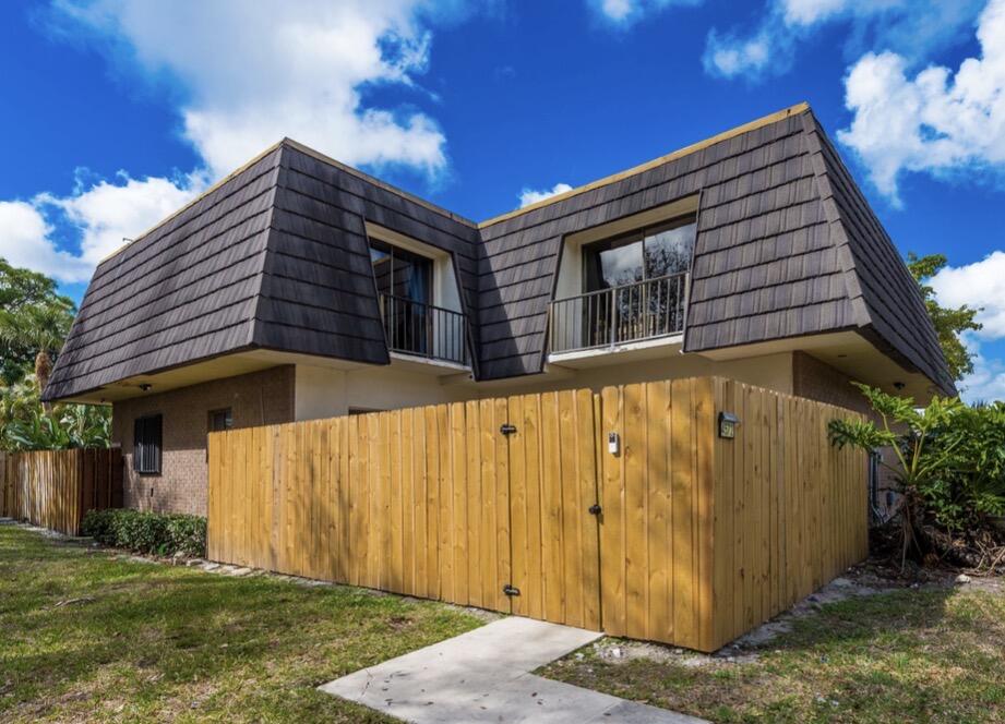 a view of a house with a large window