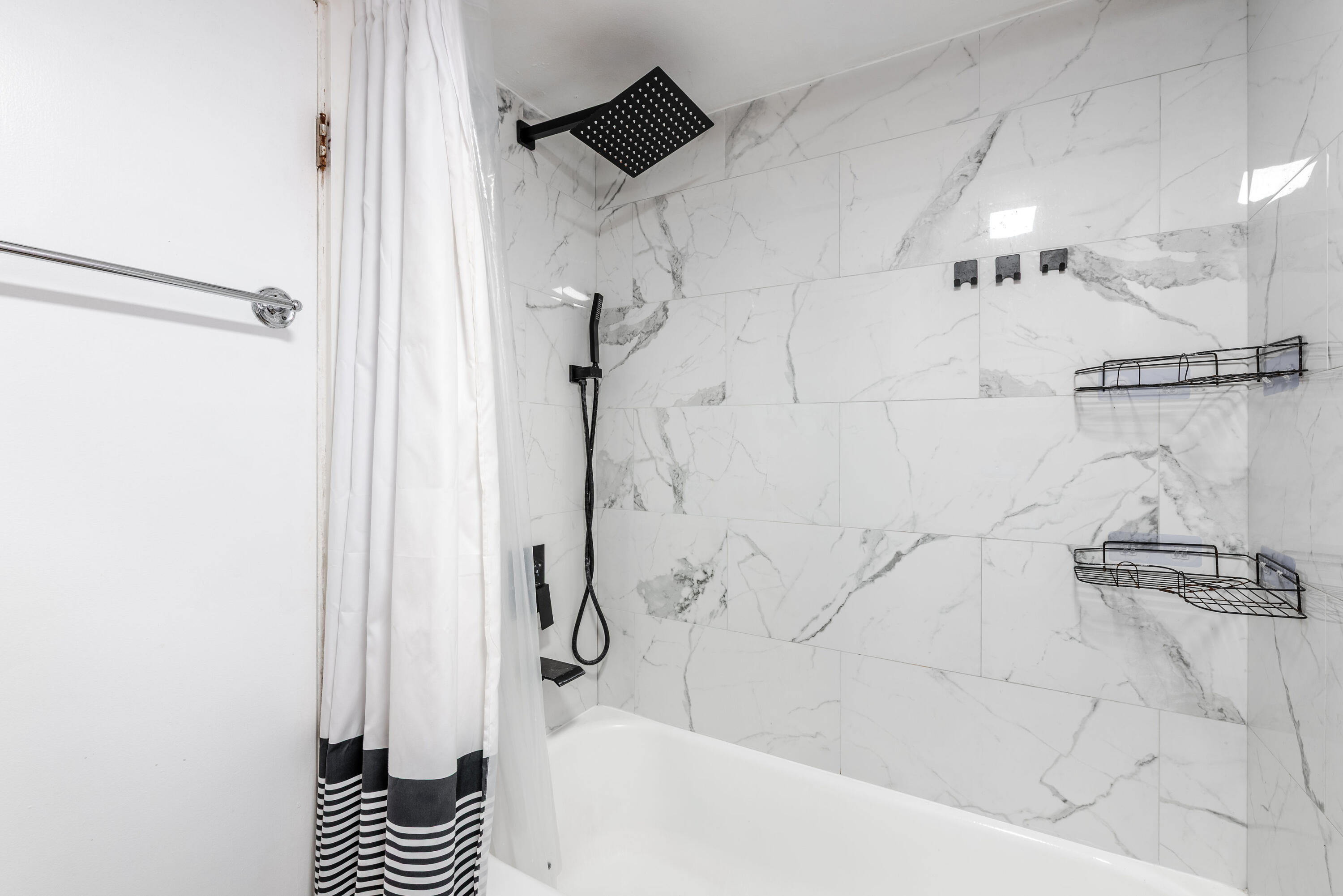 4572 Cherry Road West Palm Beach, FL 33417 - Photo 13 of 27 a bathroom with a shower and a shower