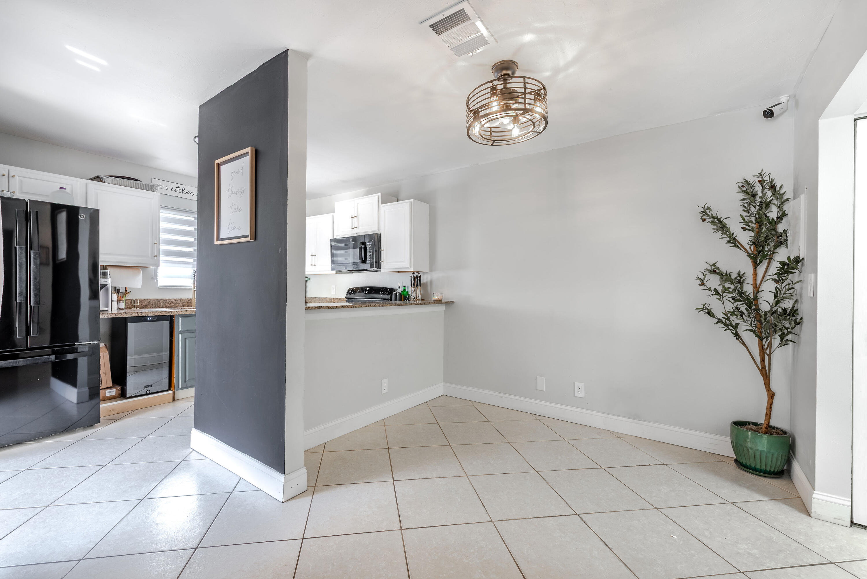 4572 Cherry Road West Palm Beach, FL 33417 - Photo 16 of 27 a view of kitchen with furniture and stainless steel appliances