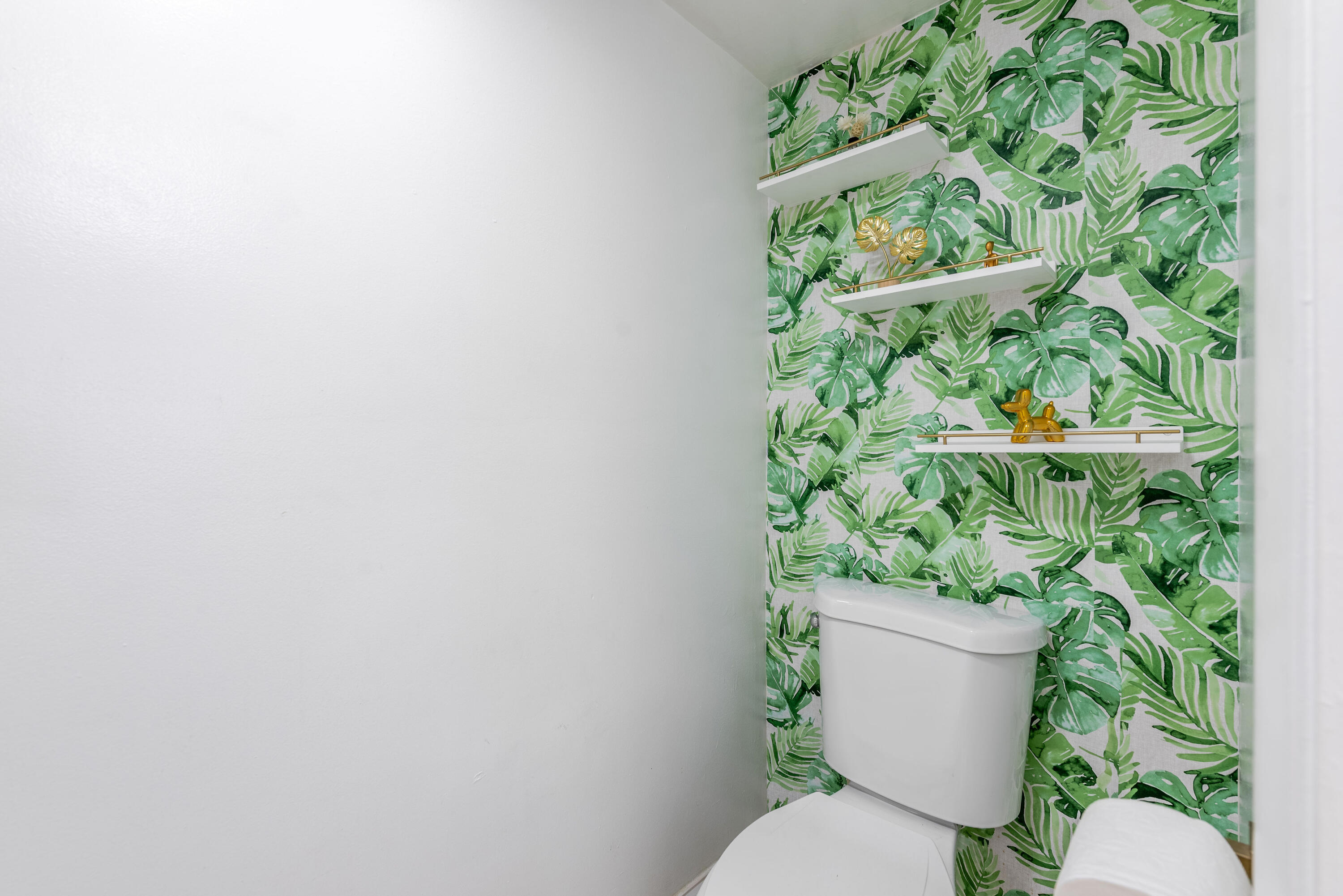 4572 Cherry Road West Palm Beach, FL 33417 - Photo 18 of 27 a white toilet sitting in a flower pot