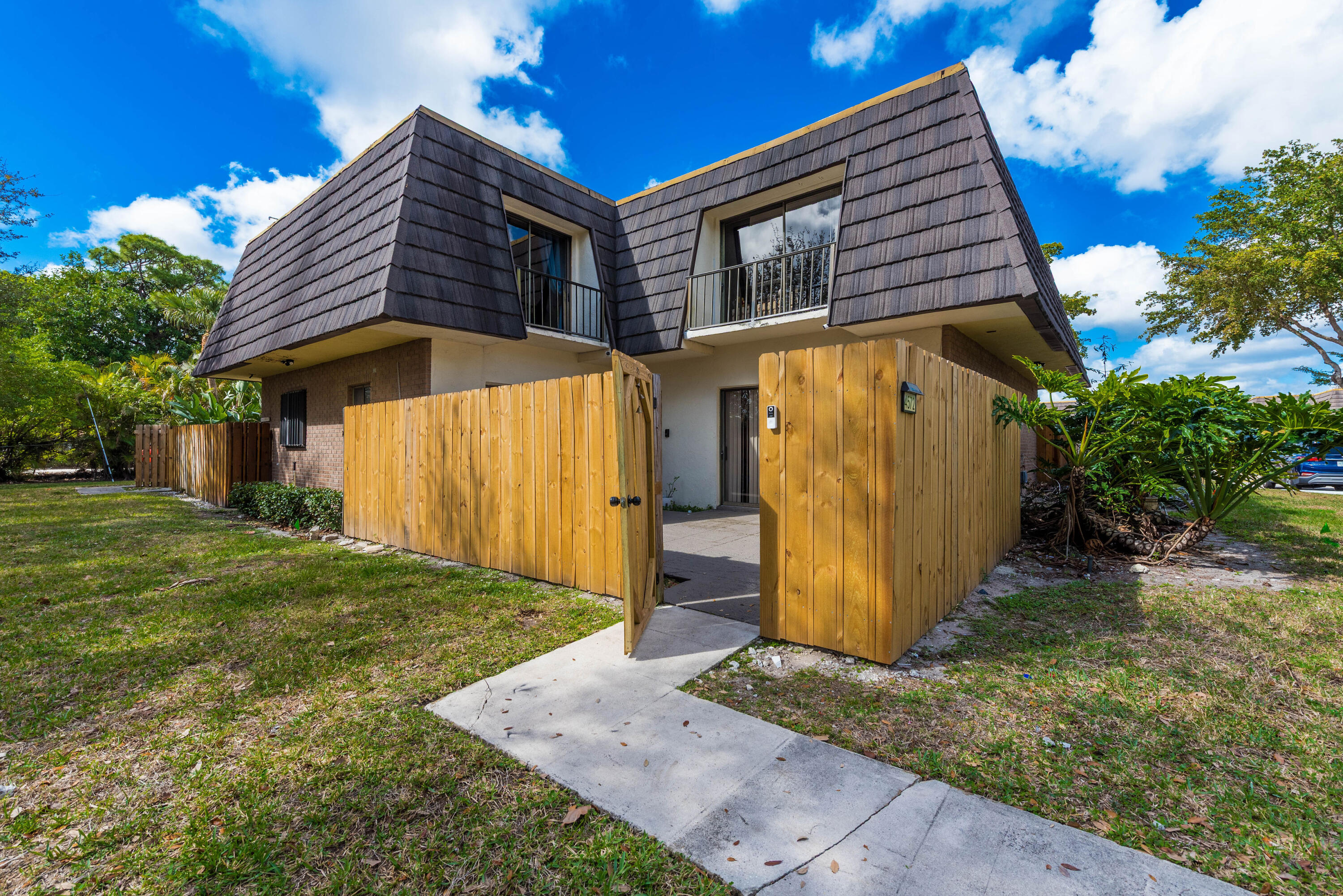 4572 Cherry Road West Palm Beach, FL 33417 - Photo 24 of 27 a view of a back yard of the house