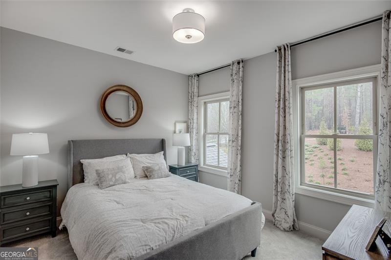 3450 Commander Suwanee, GA 30024 - Photo 30 of 52 a bedroom with a bed and a window