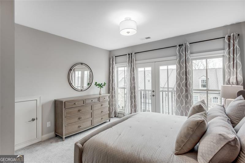 3450 Commander Suwanee, GA 30024 - Photo 35 of 52 a bedroom with a large bed and a large window