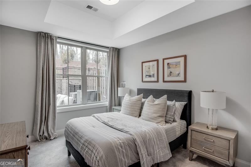 3450 Commander Suwanee, GA 30024 - Photo 39 of 52 a bedroom with a bed and a window