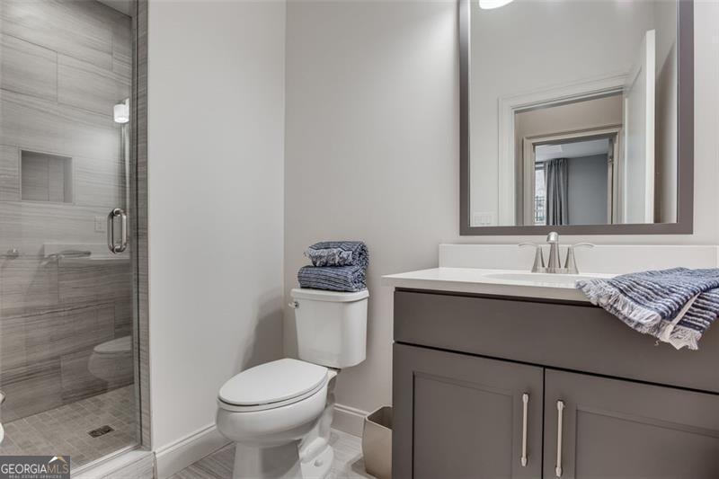 3450 Commander Suwanee, GA 30024 - Photo 40 of 52 a bathroom with a sink toilet and shower