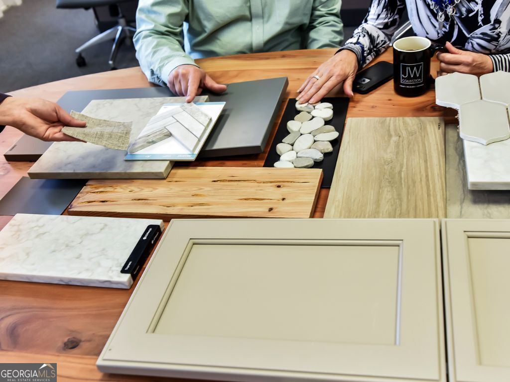 3450 Commander Suwanee, GA 30024 - Photo 47 of 52 view of living room with furniture and wooden floor