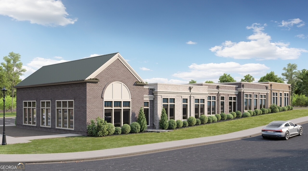 3450 Commander Suwanee, GA 30024 - Photo 49 of 52 a front view of a house with a garden