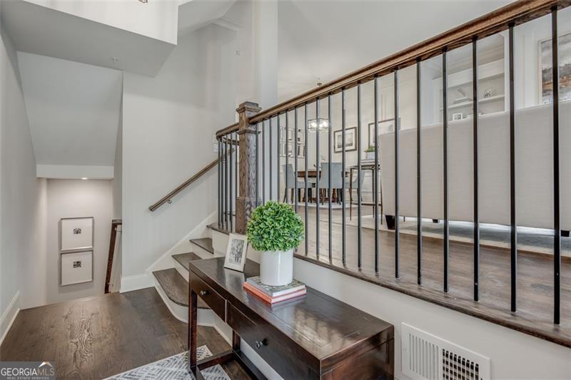 3450 Commander Suwanee, GA 30024 - Photo 9 of 52 a view of a hallway with furniture and stairs
