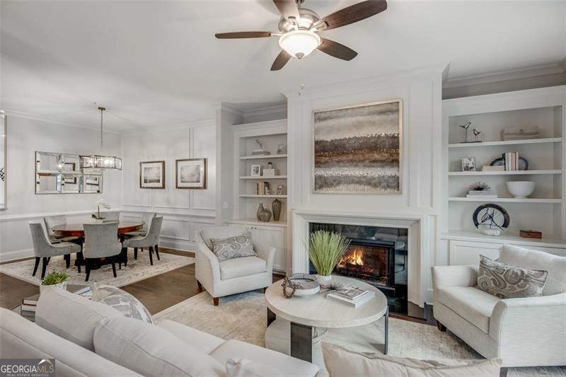 3450 Commander Suwanee, GA 30024 - Photo 10 of 52 a living room with furniture and a fireplace