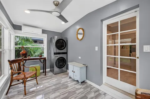 a bedroom with a bed and furniture