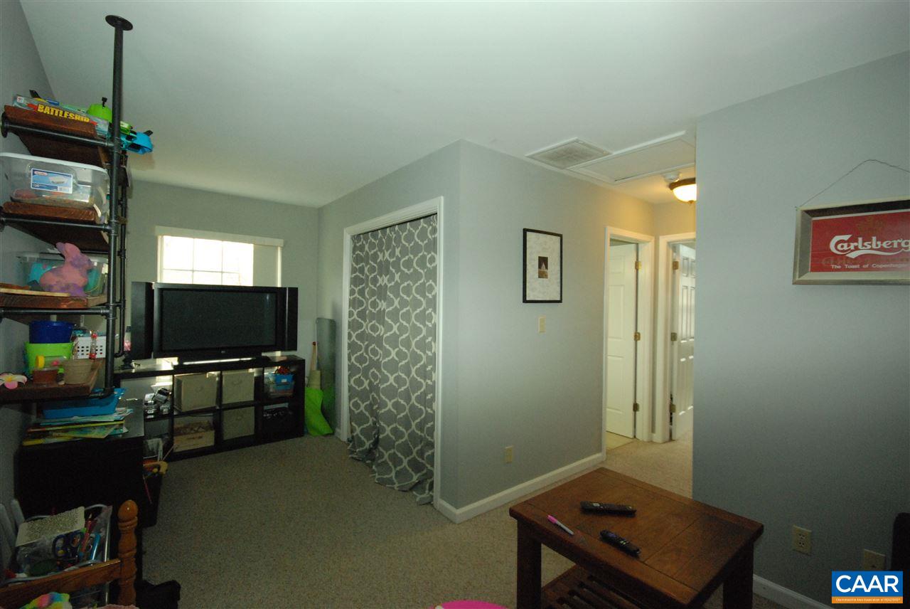 987 Amber Ridge Road Charlottesville, VA 22901 - Photo 13 of 19 a living room with furniture and a flat screen tv