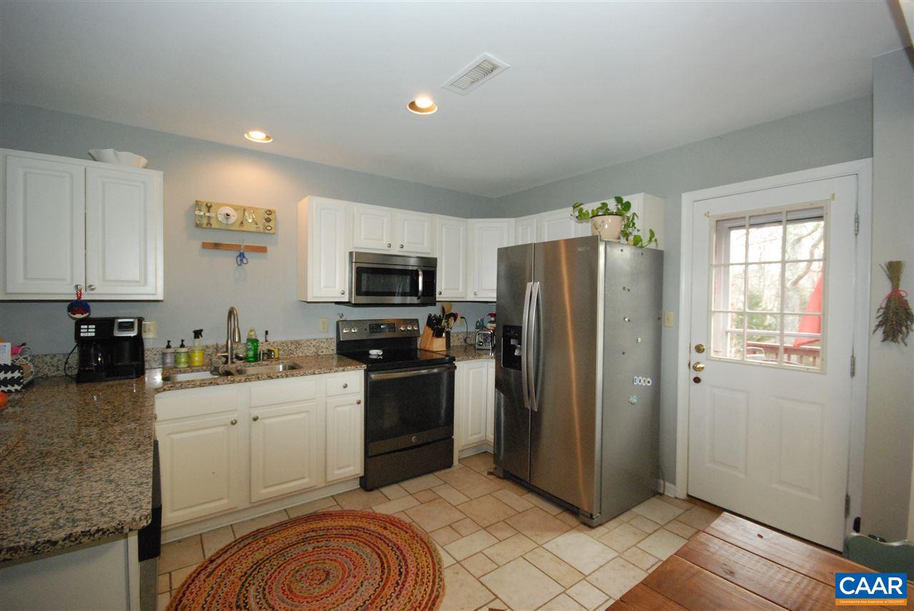 987 Amber Ridge Road Charlottesville, VA 22901 - Photo 4 of 19 a kitchen with stainless steel appliances a refrigerator sink and microwave