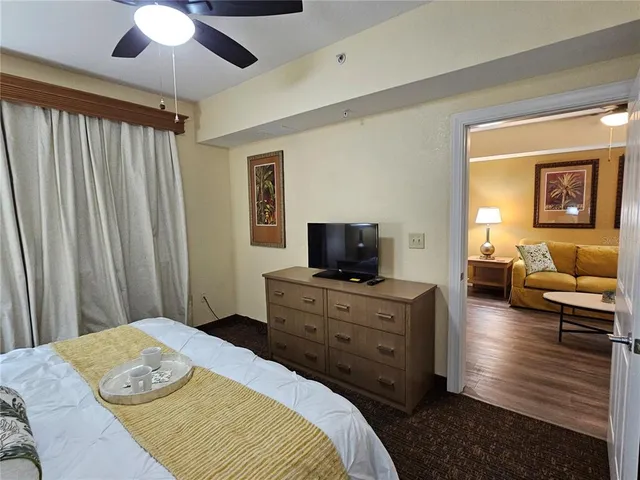 a bedroom with a bed and furniture