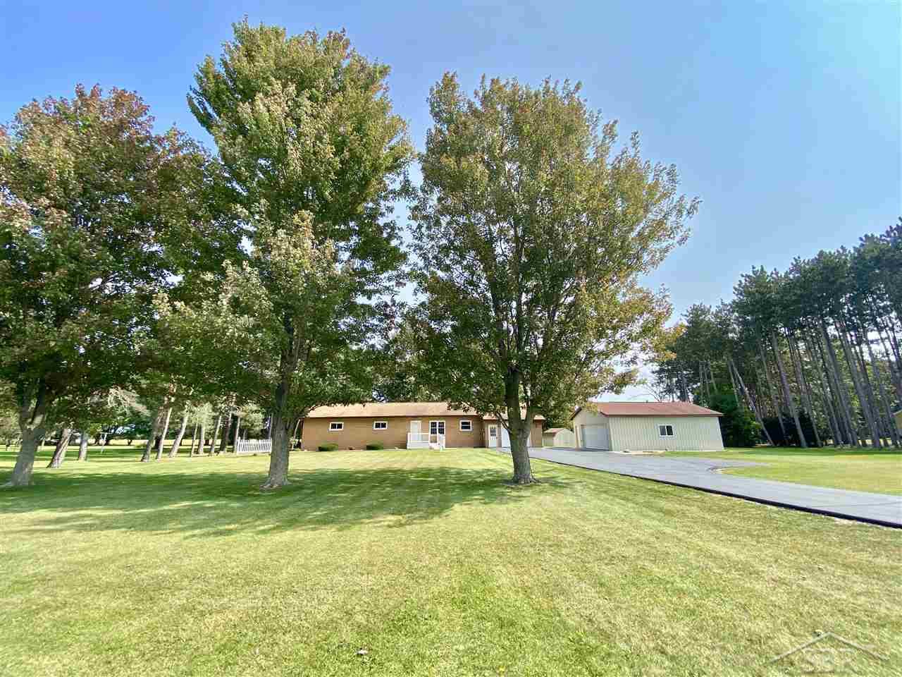 685 South Chapin Road Merrill, MI 48637 - Photo 3 of 43 Large yard with mature trees.