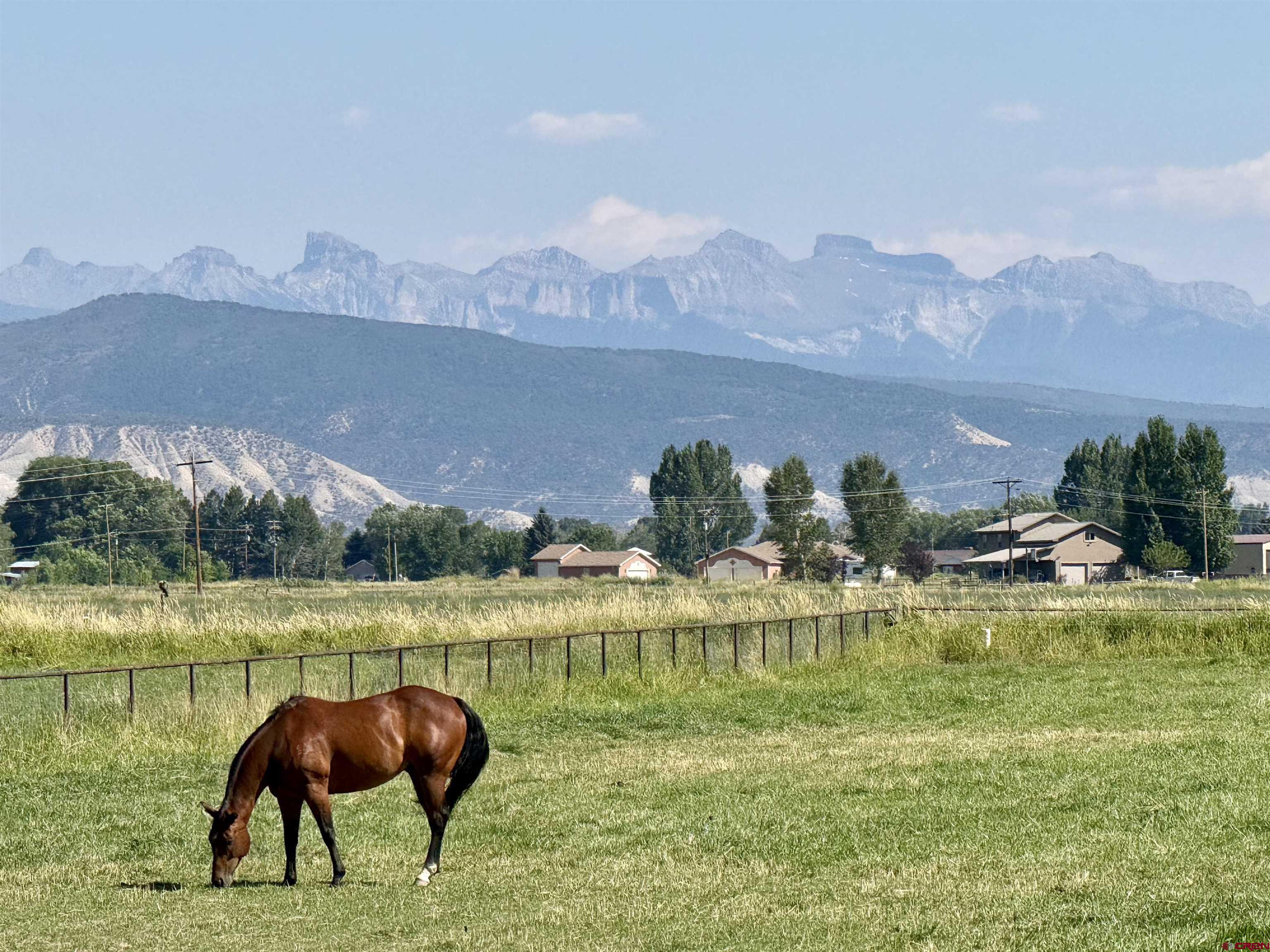 66176 Riverside Road Montrose, CO 81403 - Photo 44 of 45 a view of lake with mountain in the background