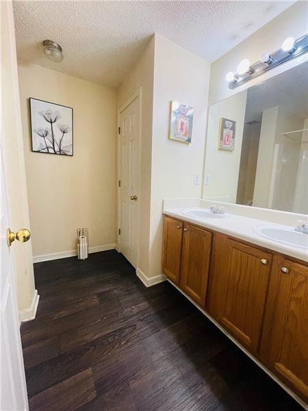 3607 Ginnis Road, Unit 3 Atlanta, GA 30331 - Photo 7 of 9 a bathroom with a sink and a mirror