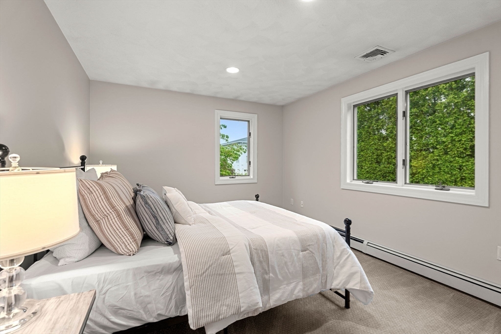 53 Gerald Road Marblehead, MA 01945 - Photo 29 of 42 a bedroom with a bed and a window