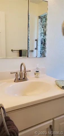 a view of bedroom with window