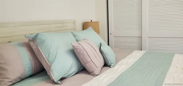 a view of a balcony with furniture
