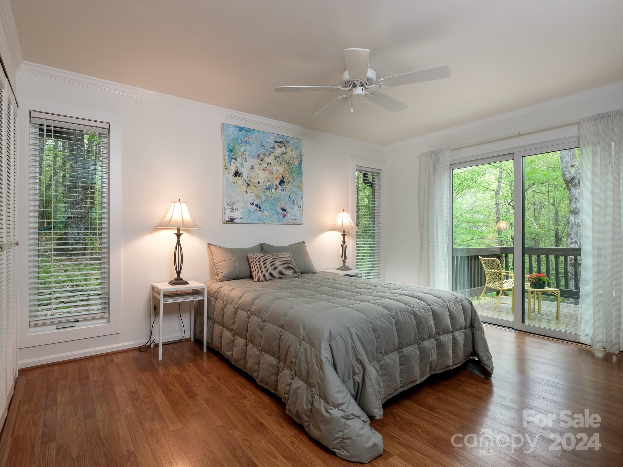 145 Catatoga Path Brevard, NC 28712 - Photo 17 of 41 a bedroom with a large bed and a window