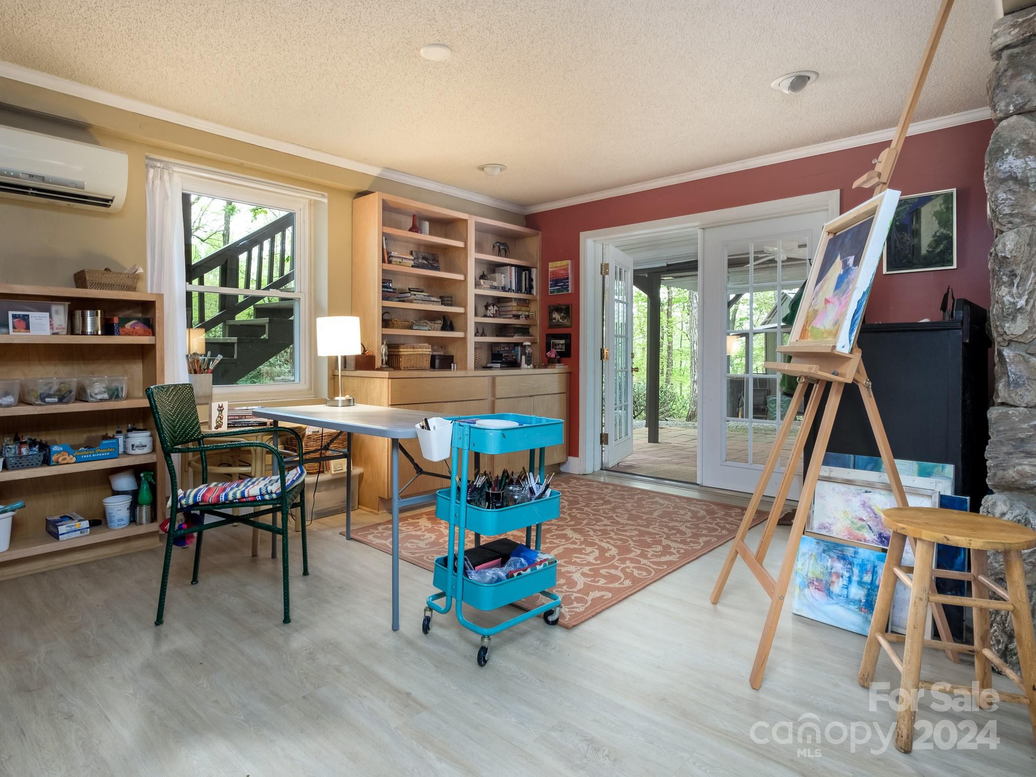 145 Catatoga Path Brevard, NC 28712 - Photo 25 of 41 a living room filled with furniture and a potted plant