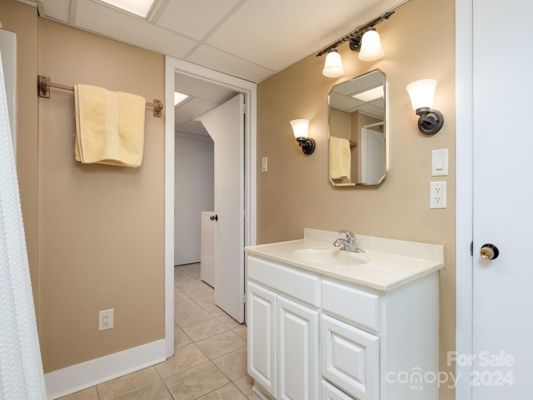 145 Catatoga Path Brevard, NC 28712 - Photo 29 of 41 a bathroom with a sink vanity and mirror