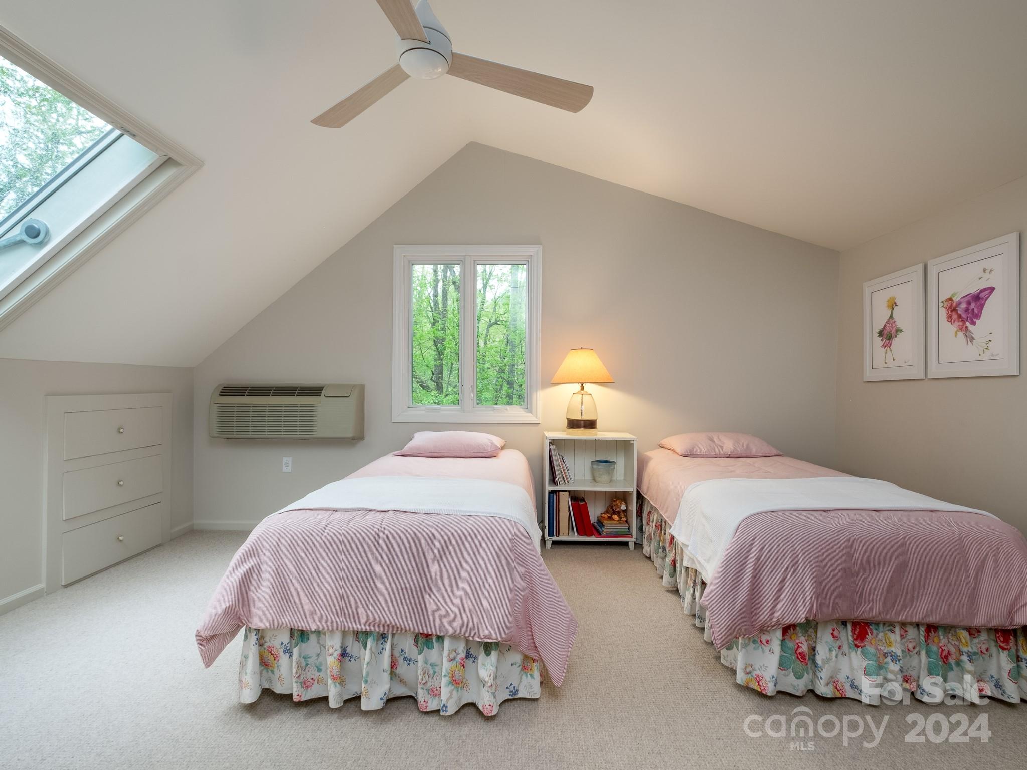 145 Catatoga Path Brevard, NC 28712 - Photo 32 of 41 a bedroom with a bed and a window