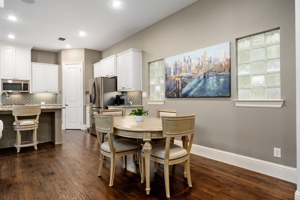 531 Sandy Lane Flower Mound, TX 75022 - Photo 20 of 32 Hardwood flooring extends into a kitchen