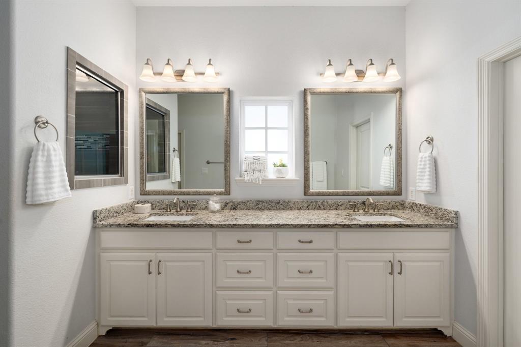 531 Sandy Lane Flower Mound, TX 75022 - Photo 31 of 32 Dual vanity with lots of storage, granite countertops, and undermount sinks