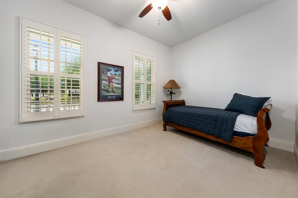 531 Sandy Lane Flower Mound, TX 75022 - Photo 8 of 32 Bright front room has large windows with plantation shutters