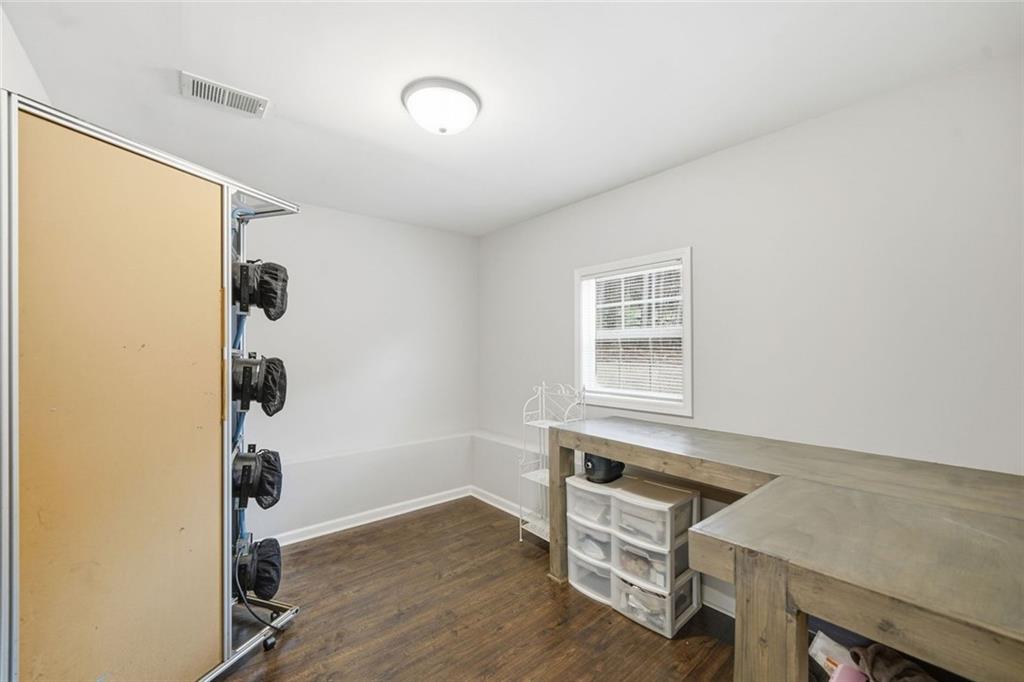 302 White Marble Way Ball Ground, GA 30107 - Photo 20 of 28 a view of an empty room with a window
