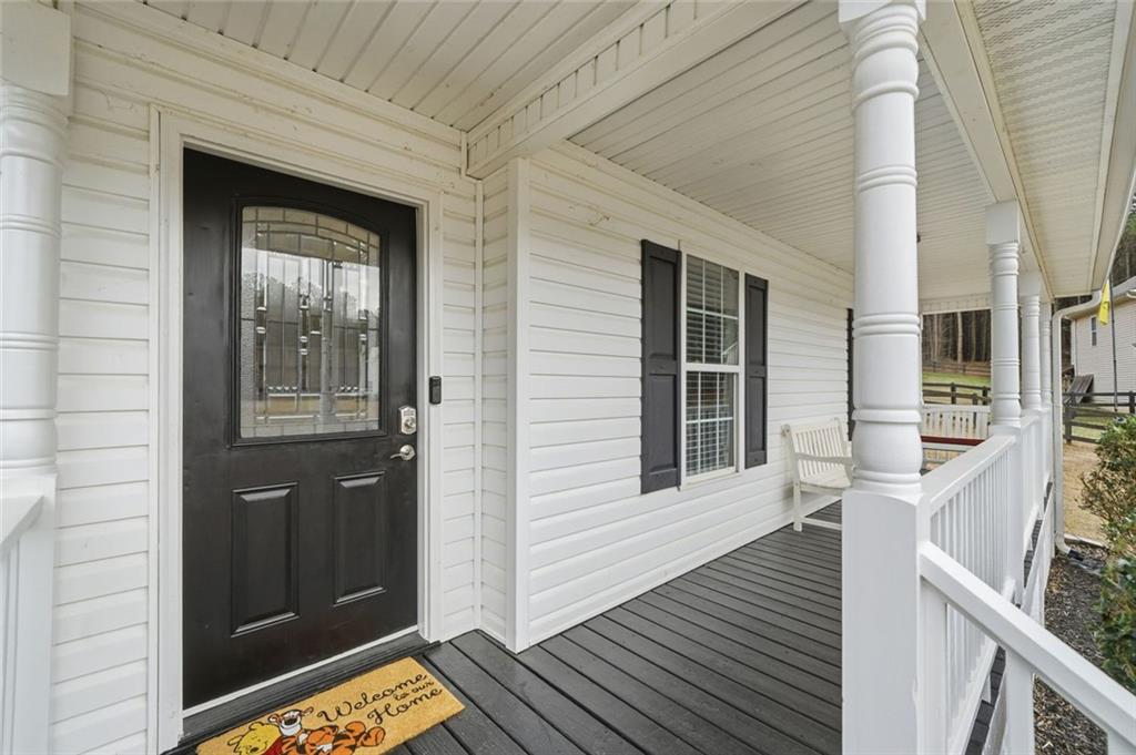 302 White Marble Way Ball Ground, GA 30107 - Photo 2 of 28 a view of an entryway of house