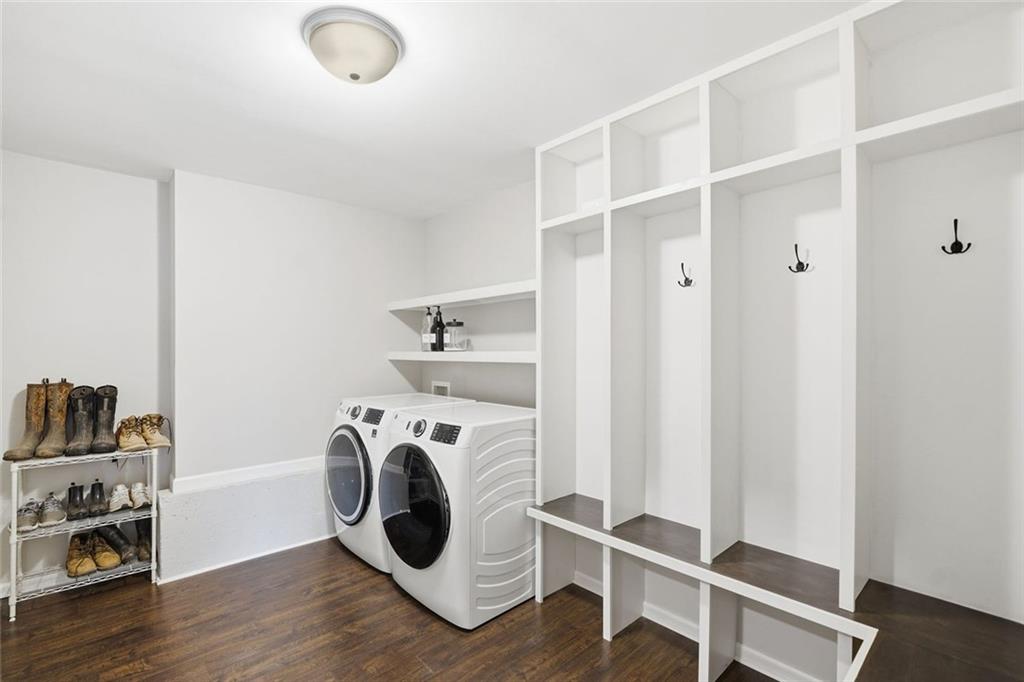 302 White Marble Way Ball Ground, GA 30107 - Photo 21 of 28 a view of walk in closet with empty racks