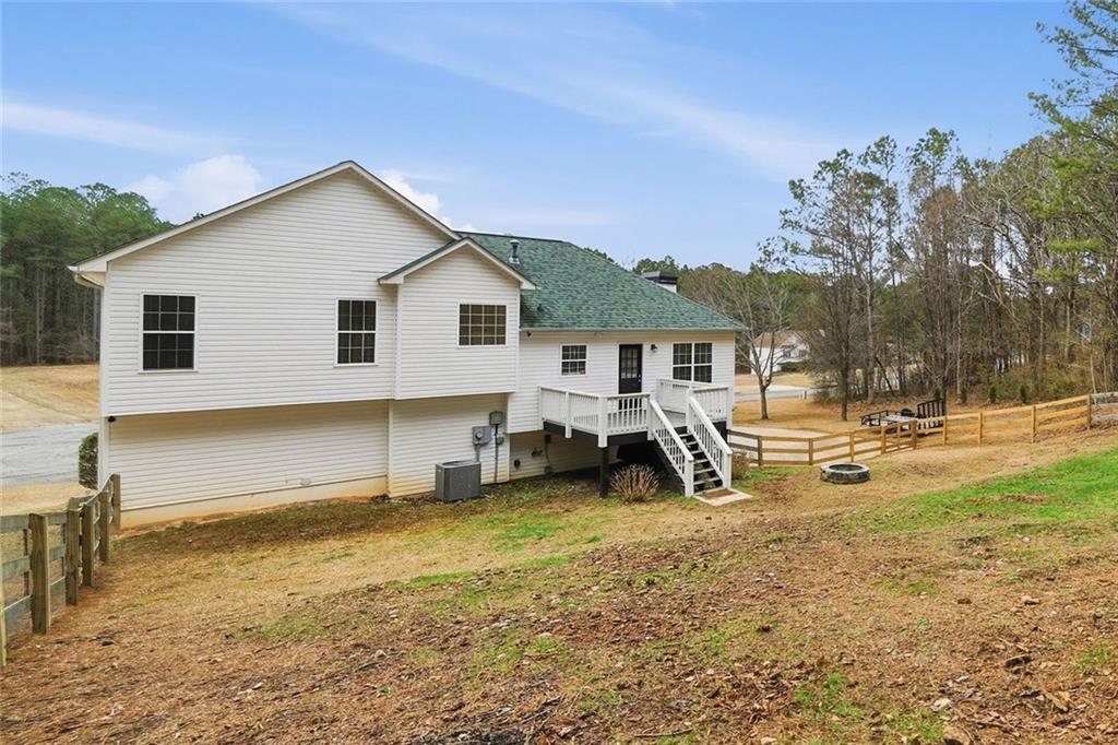 302 White Marble Way Ball Ground, GA 30107 - Photo 28 of 28 a view of a house with swimming pool and sitting area